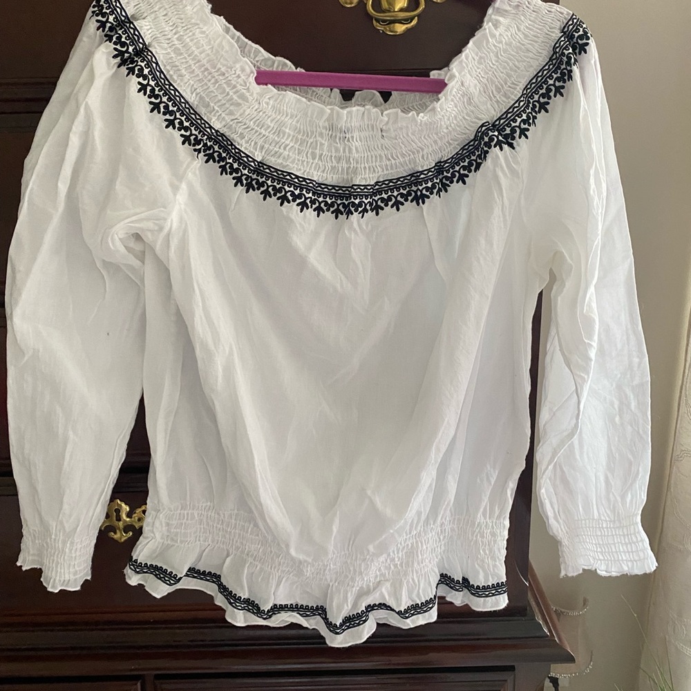 Woman’s size L white limited blouse.